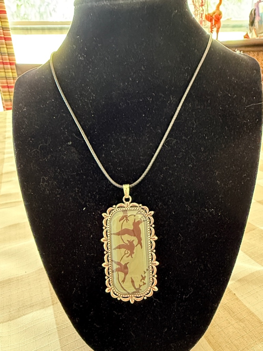 Vintage-Style Bird Silhouette Pendant Necklace in Brown and Gold
